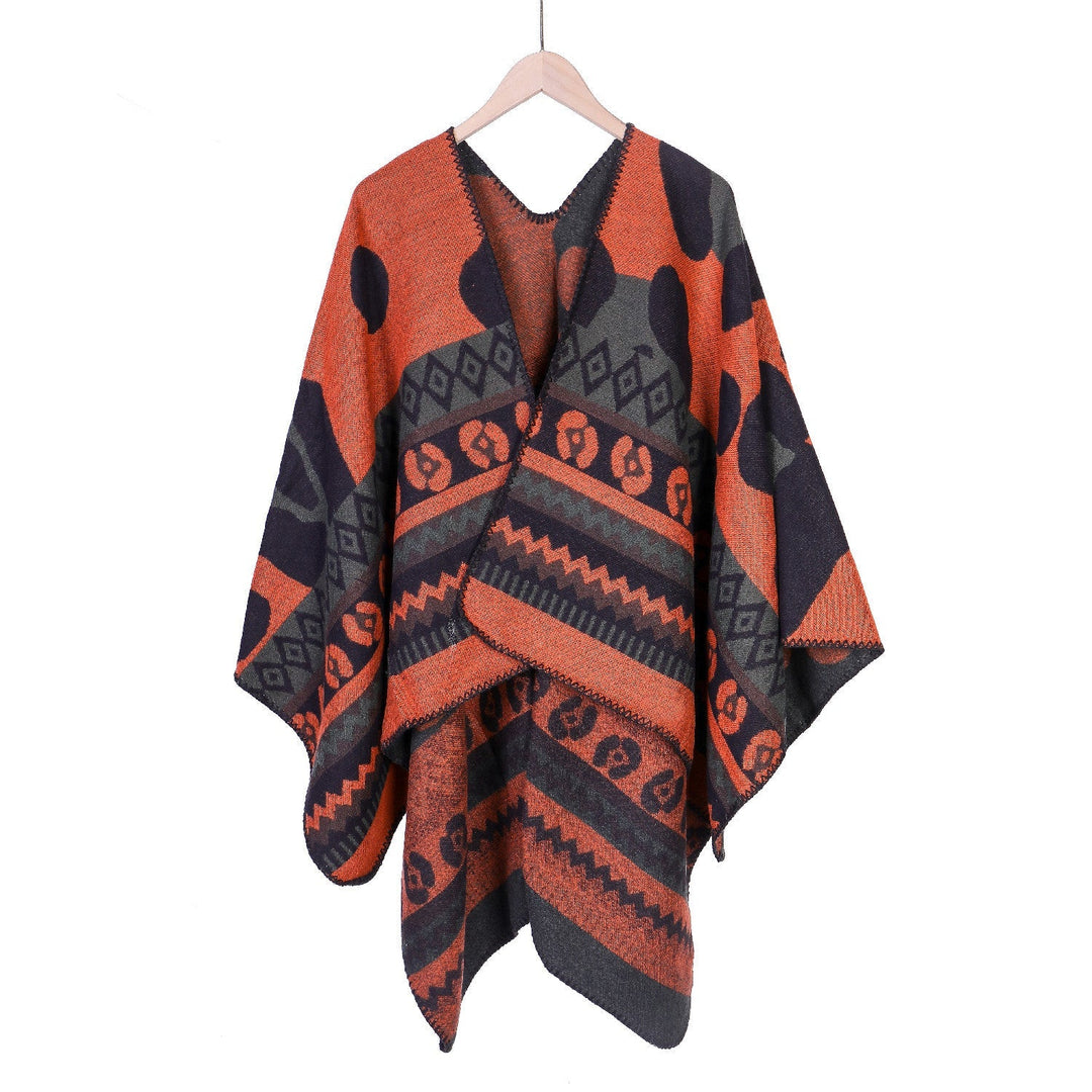 Dam Jacquard Ruana poncho med Ethno Jacquard och open oversized fall