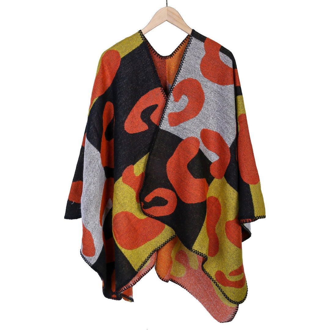 Dam oversized Ruana med abstract graphic jacquard och decorative overlock seam