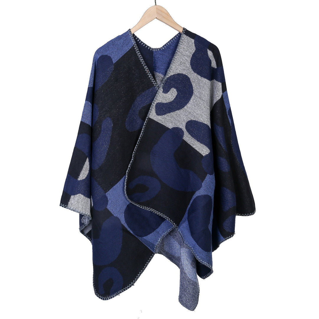 Dam oversized Ruana med abstract graphic jacquard och decorative overlock seam