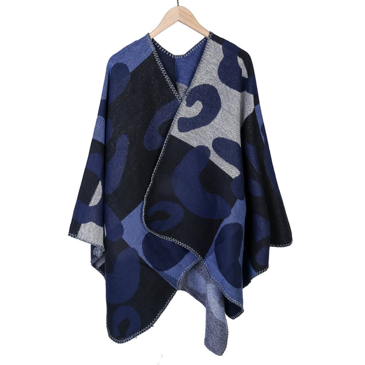 Dam oversized Ruana med abstract graphic jacquard och decorative overlock seam
