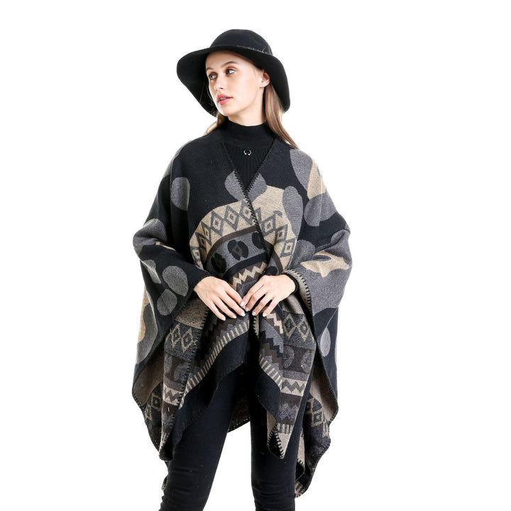 Dam Jacquard Ruana poncho med Ethno Jacquard och open oversized fall