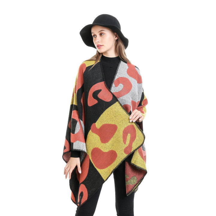 Dam oversized Ruana med abstract graphic jacquard och decorative overlock seam