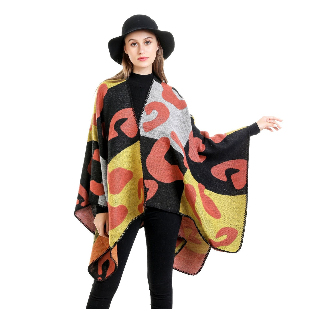 Dam oversized Ruana med abstract graphic jacquard och decorative overlock seam