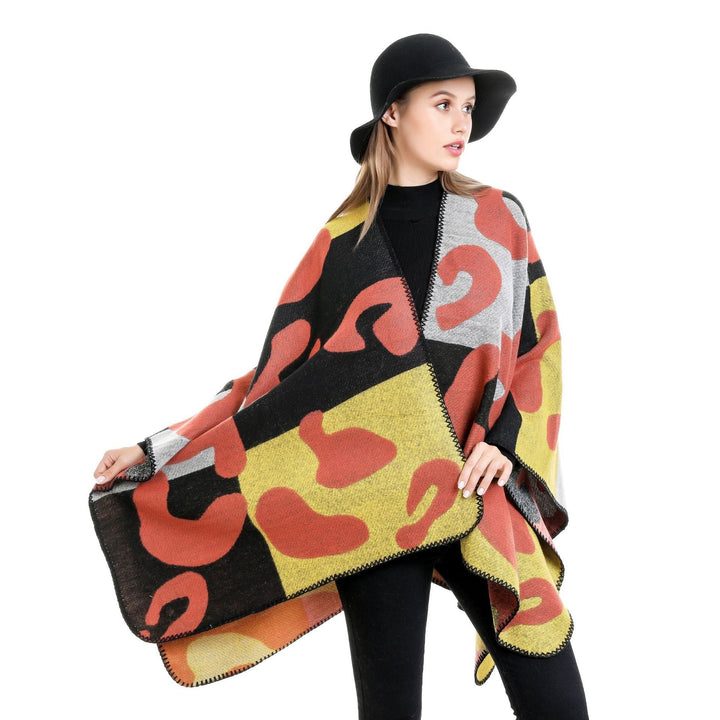 Dam oversized Ruana med abstract graphic jacquard och decorative overlock seam