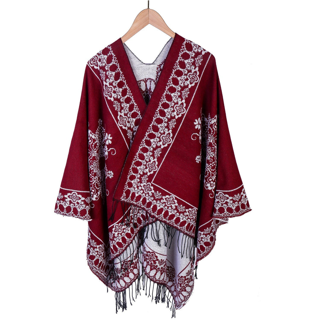 Dam Jacquard poncho i kimono skärning med fransfåll