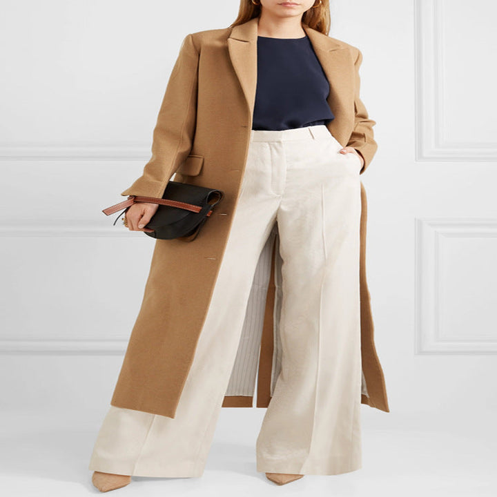 Dam Floor-Length Single-Breasted ullblandning kappa med sido Slit och minimalistisk Tailoring look