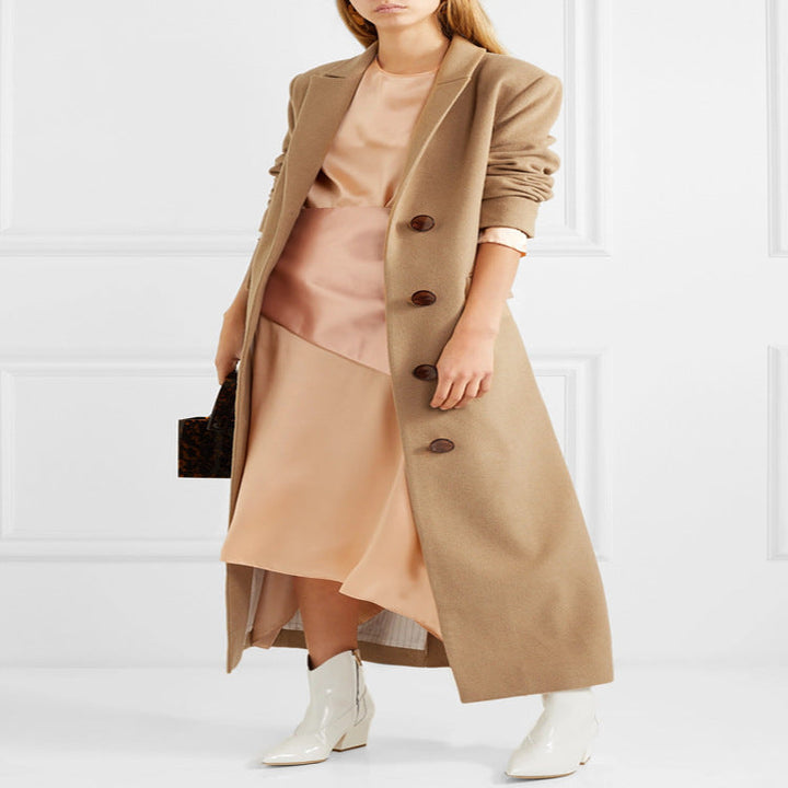 Dam Floor-Length Single-Breasted ullblandning kappa med sido Slit och minimalistisk Tailoring look
