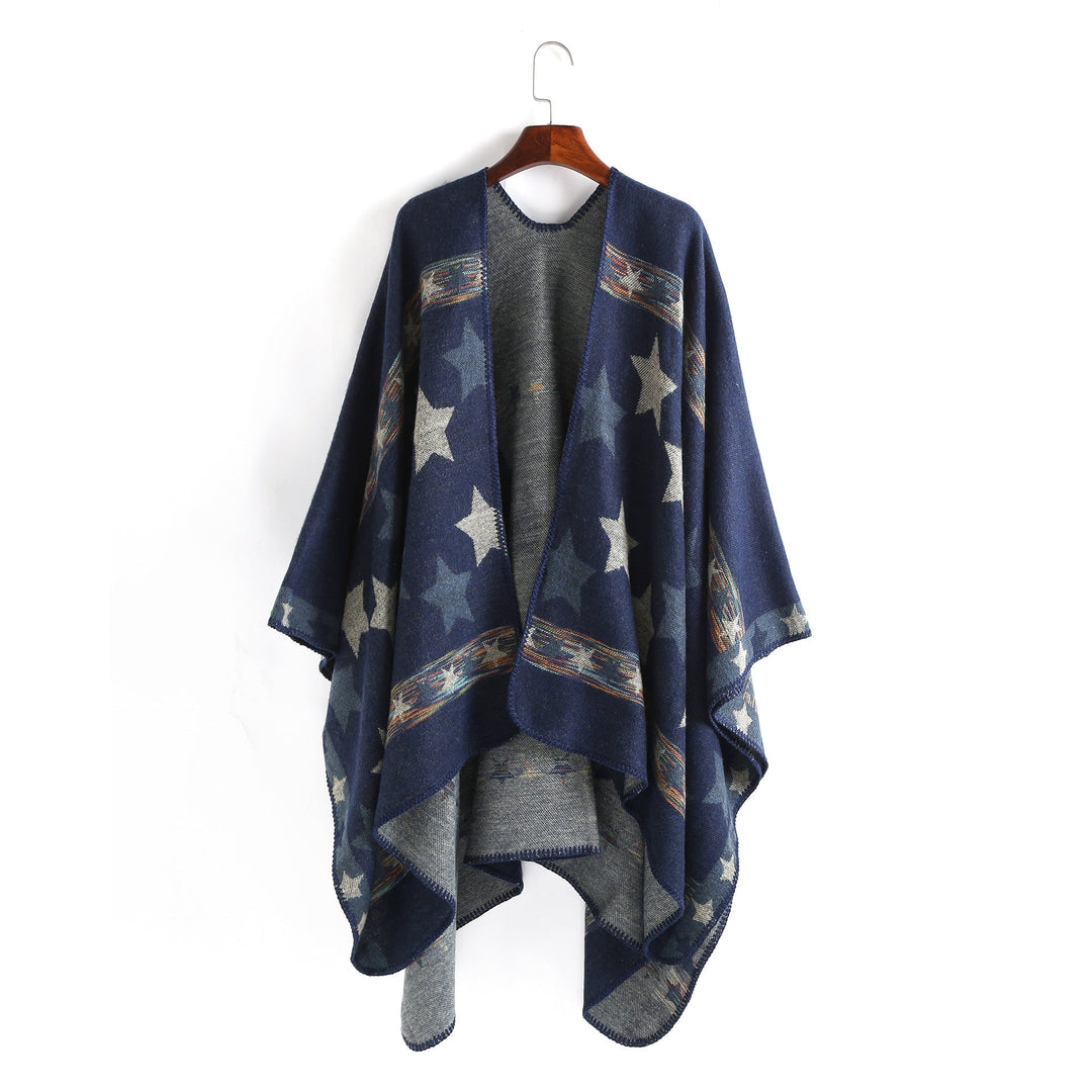 Dam Jacquard Ruana poncho med star jacquard och softly falling oversized silhuett