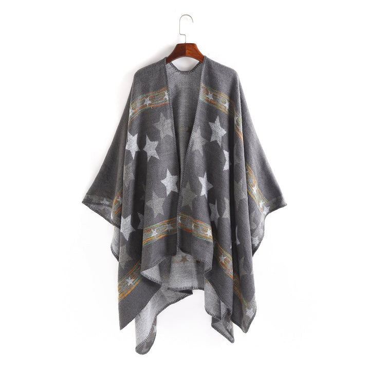 Dam Jacquard Ruana poncho med star jacquard och softly falling oversized silhuett