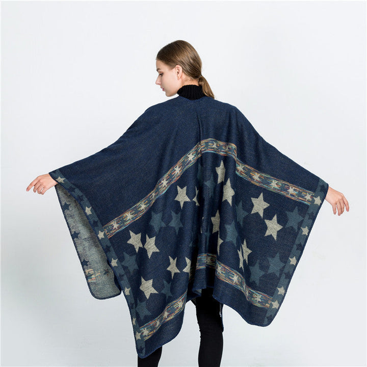 Dam Jacquard Ruana poncho med star jacquard och softly falling oversized silhuett