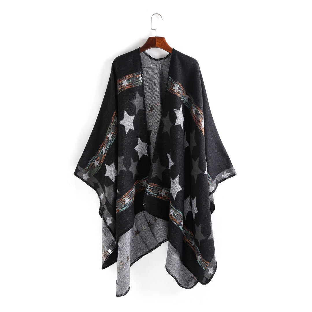 Dam Jacquard Ruana poncho med star jacquard och softly falling oversized silhuett