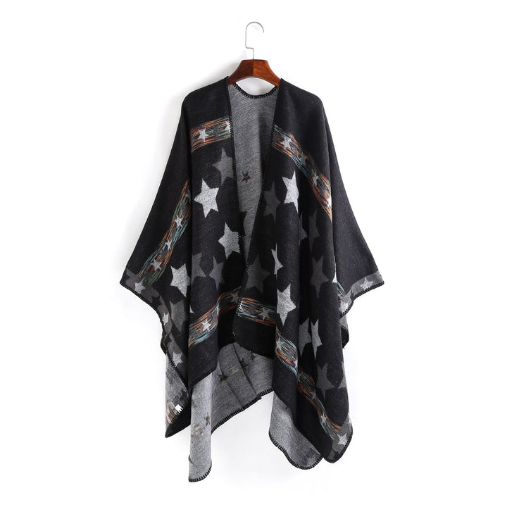 Dam Jacquard Ruana poncho med star jacquard och softly falling oversized silhuett