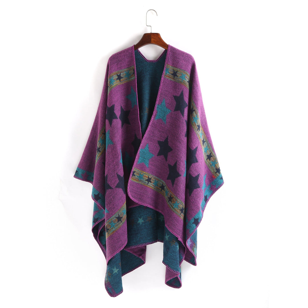 Dam Jacquard Ruana poncho med star jacquard och softly falling oversized silhuett