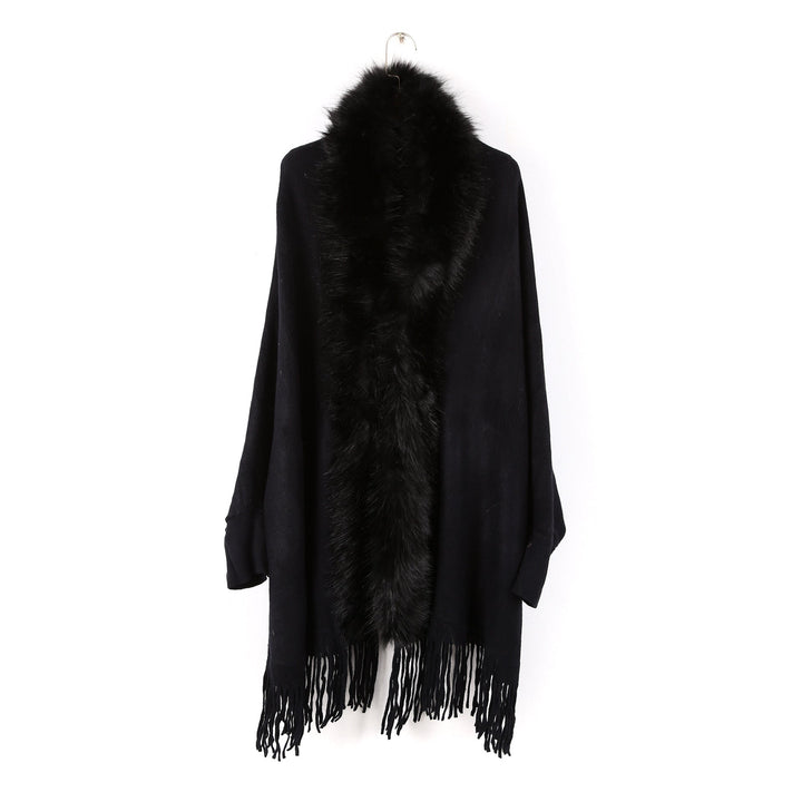 Dam poncho med fuskpälskrage och fringed fåll