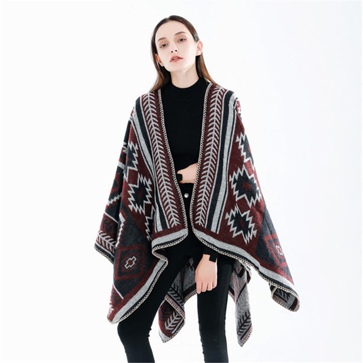 Dam Ethno-Jacquard Ruana-poncho med boxy oversized passform och decorative chain stitch.