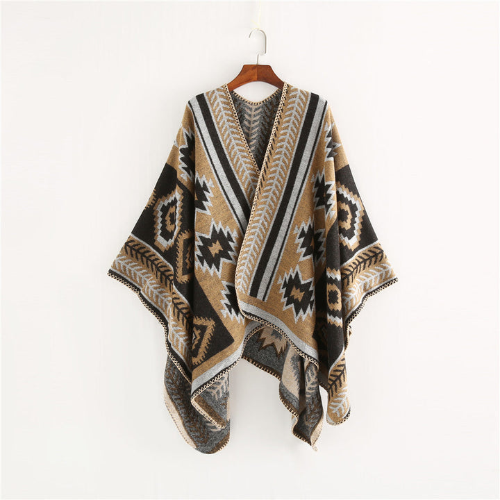 Dam Ethno-Jacquard Ruana-poncho med boxy oversized passform och decorative chain stitch.