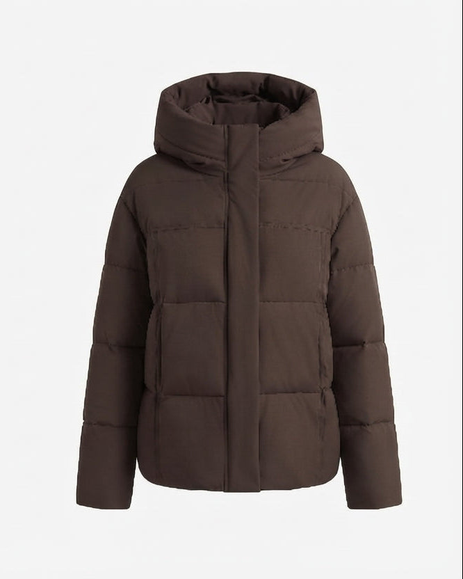 Dam kort boxy kviltad puffer med integrated huva och sido zip fickor