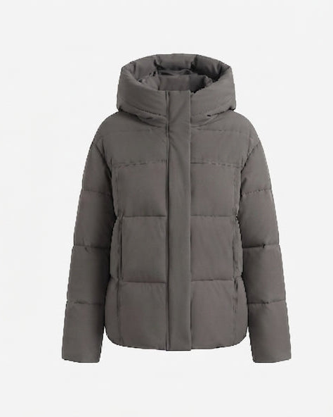 Dam kort boxy kviltad puffer med integrated huva och sido zip fickor