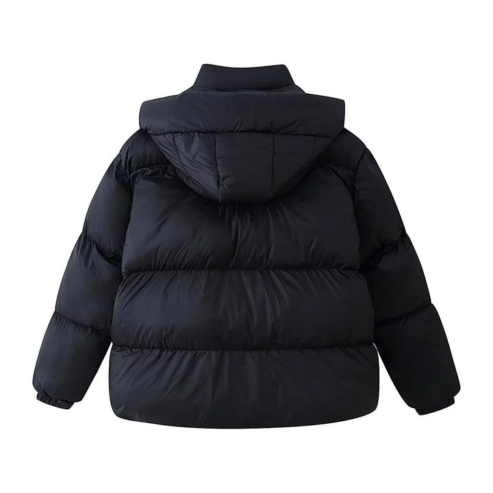 Dam oversized quiltad jacka med voluminous huva och påsydda fickor