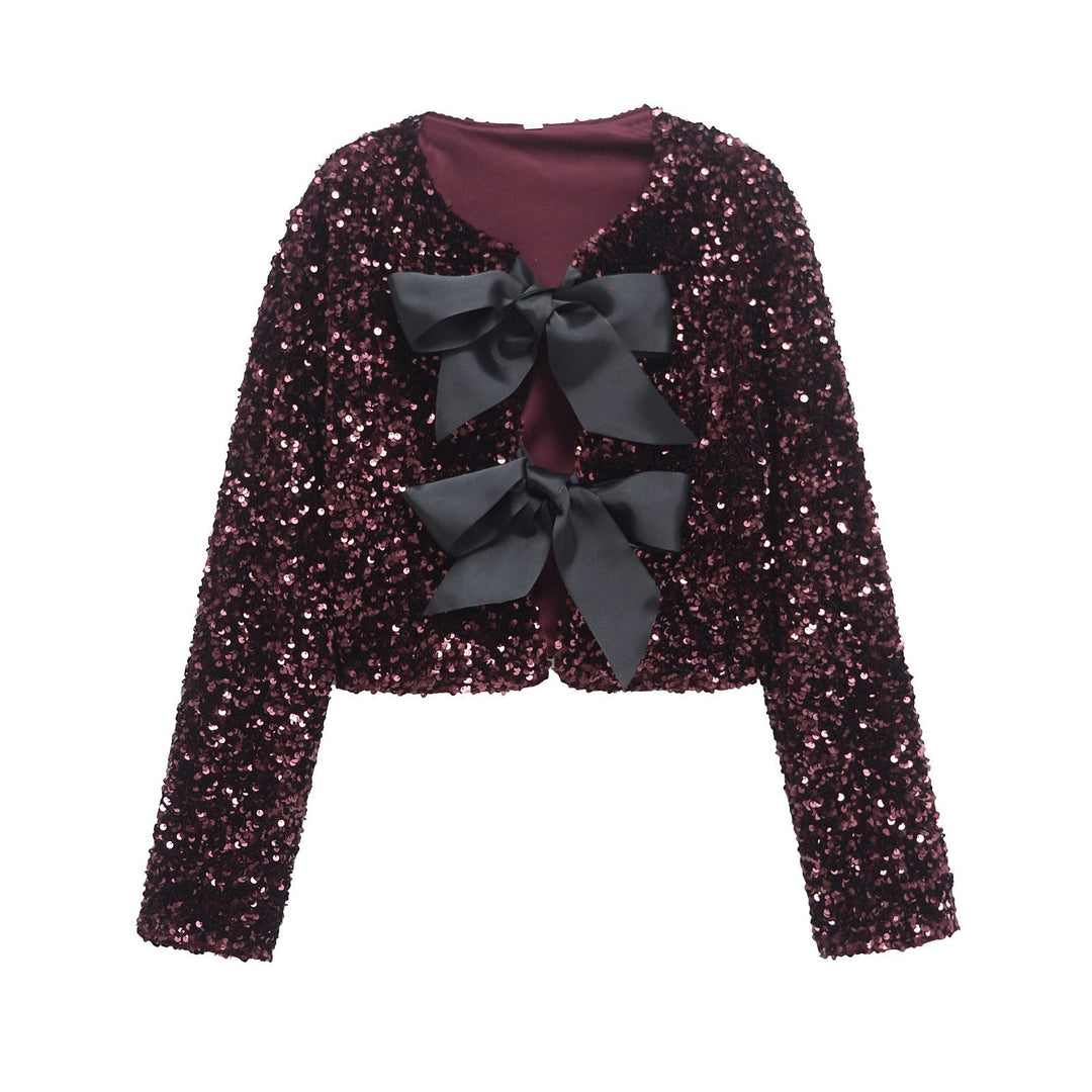 Dam sequin bolero jacka med double bow closure, vadderad foder och figurnära cropped skärning
