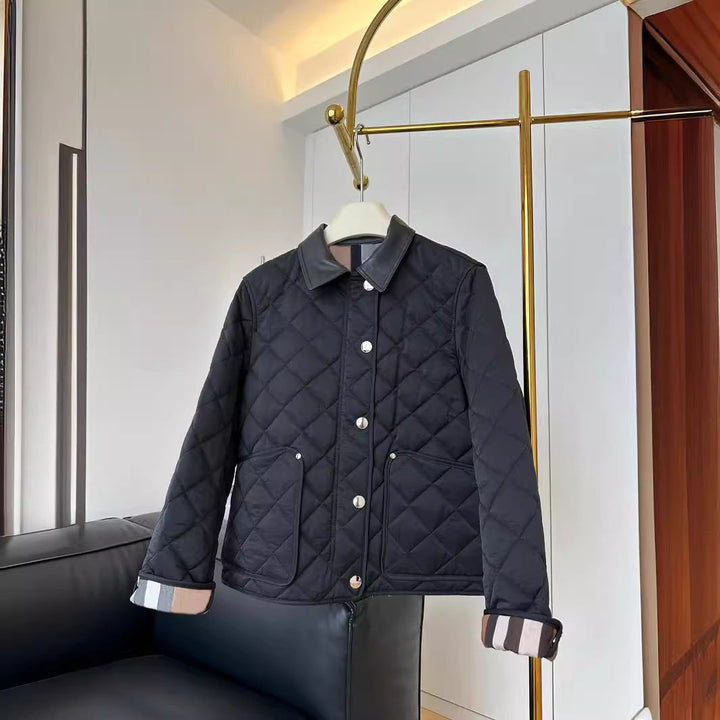 Dam modern kviltad jacka med elegant läder krage