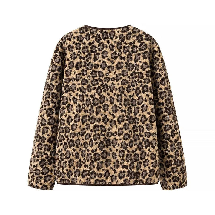 Dam teddy jacka med leopardprint button closure och manchester kant
