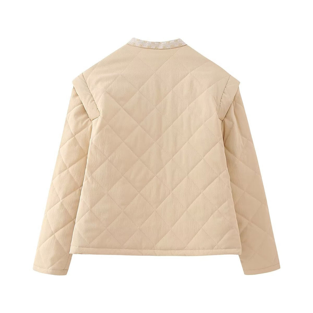 Dam quiltad jacka med floral embroidery kant, straight skärning och rund hals