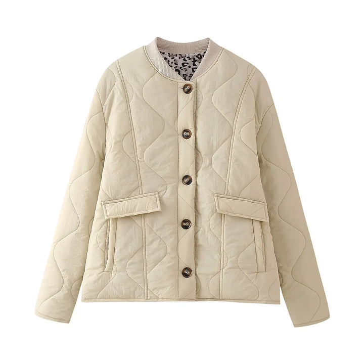 Dam vadderad övergångsjacka med ribbed krage och flap fickor
