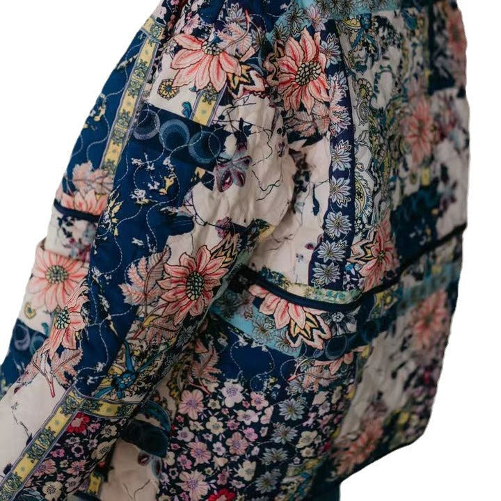 Dam vadderad kviltad jacka in blommig Patchwork look