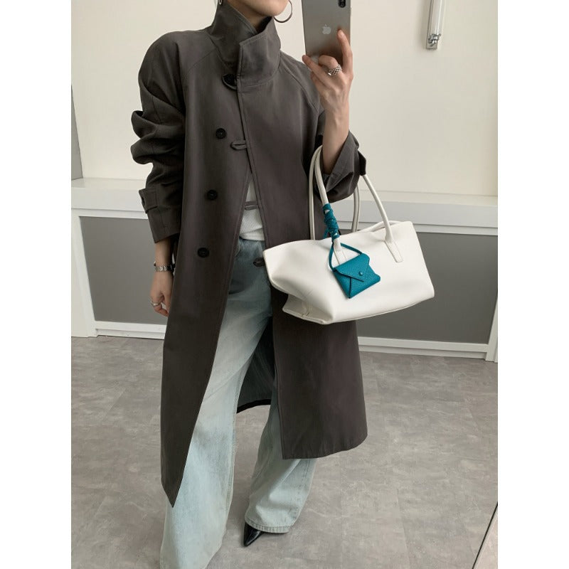 Dam Mid-length trenchcoat med hög ståkrage, knytband och avslappnad oversize silhuett