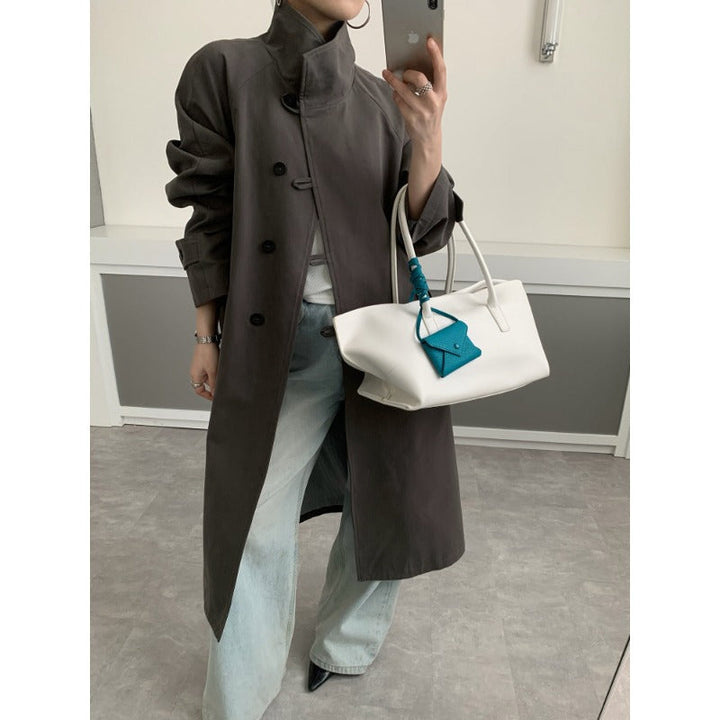 Dam Mid-length trenchcoat med hög ståkrage, knytband och avslappnad oversize silhuett