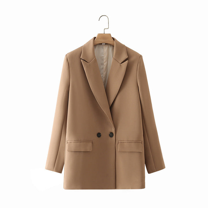Dam figursydd lång blazer i oversized look med lapel krage och påsydda fickor