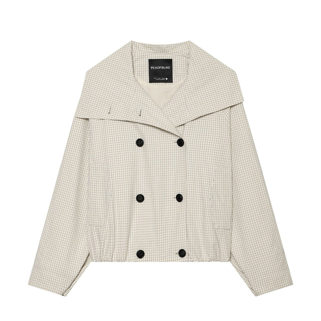 Dam kort skärning double-breasted trenchcoat med oversized sjalkrage och elastisk fåll