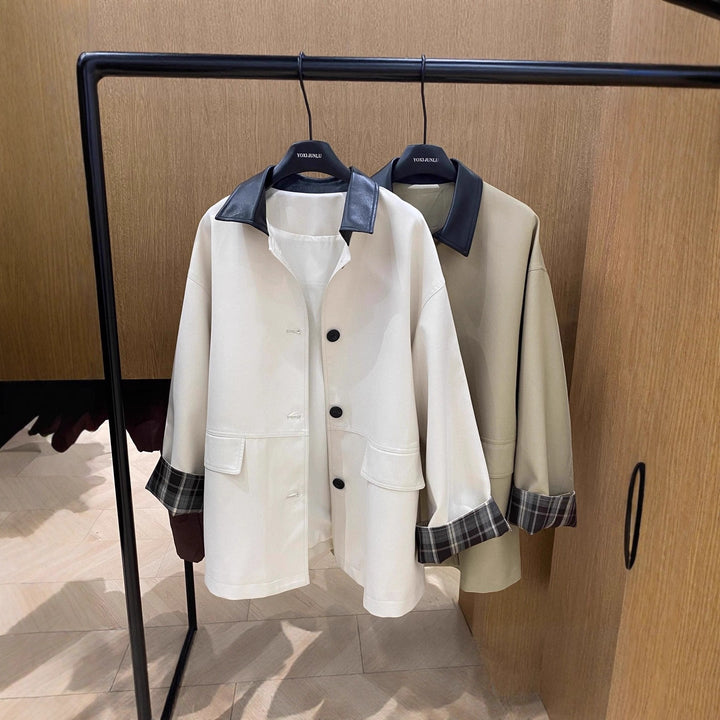 Dam oversize trenchcoat med kontrast krage och rutig foder