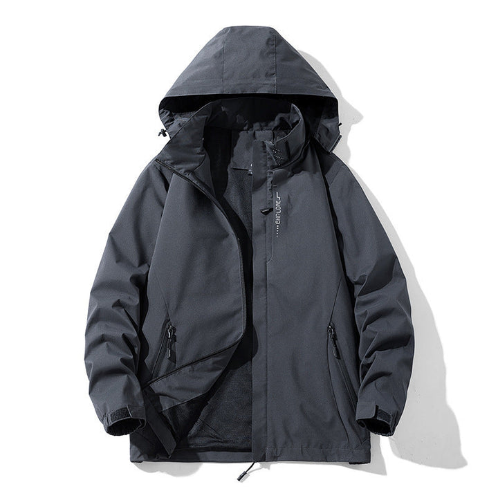 Dam vattentät outdoorjacka med andningsbar mesh foder, fickor med dragkedja, och Velcro cuffs
