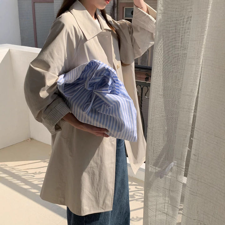 Dam Elegante och Zeitlose Trenchcoat