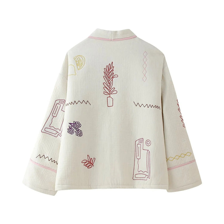 Dam non-quiltad kimono jacka med decorative embroidery, påsydda fickor, och avslappnad oversized skärning