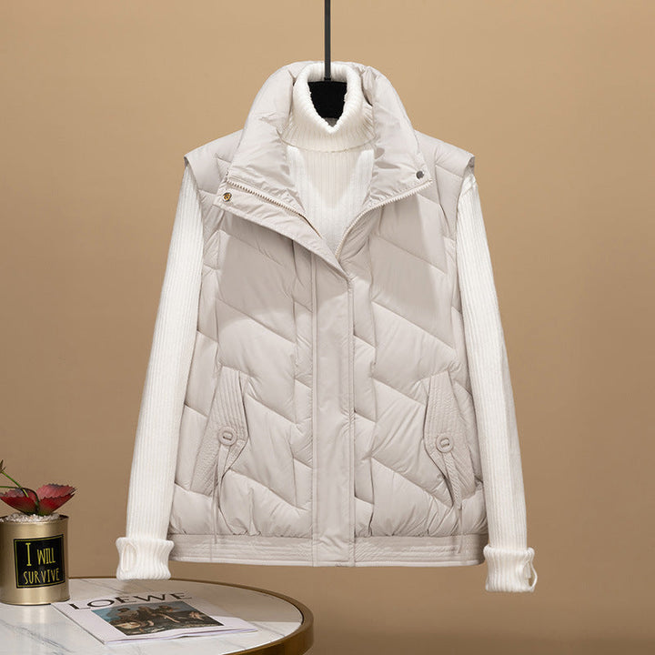 Dam sleeveless thermo quiltad väst med ergonomic square quiltning, high ståkrage, och decorative pocket flaps