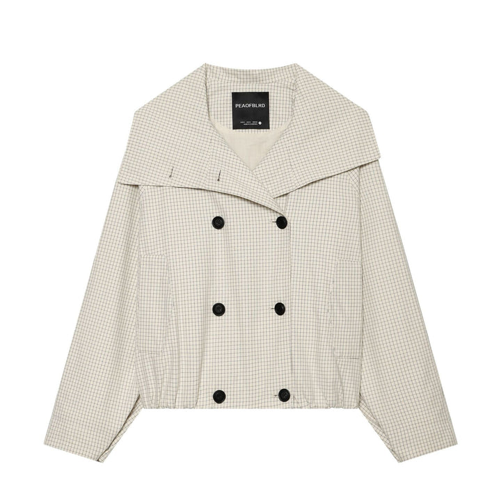 Dam kort skärning double-breasted trenchcoat med oversized sjalkrage och elastisk fåll