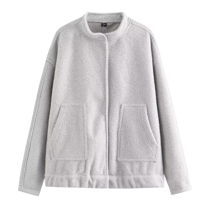 Dam kort boxy jacka i ullblandning med kort ståkrage, concealed front placket och påsydda fickor
