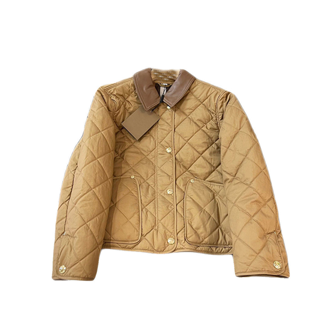 Dam modern kviltad jacka med elegant läder krage