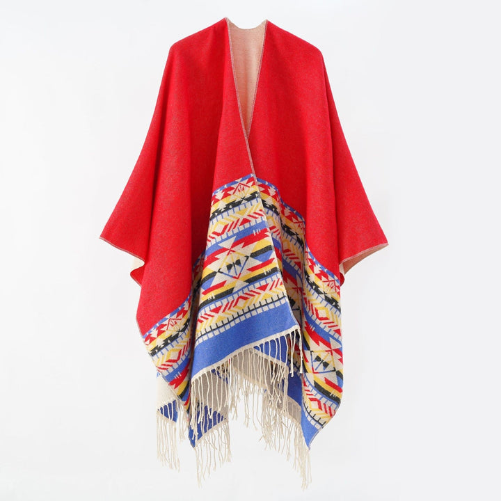 Dam Oversize Reversible poncho tillverkad av ullblandning med Ethno Jacquard och fransfåll