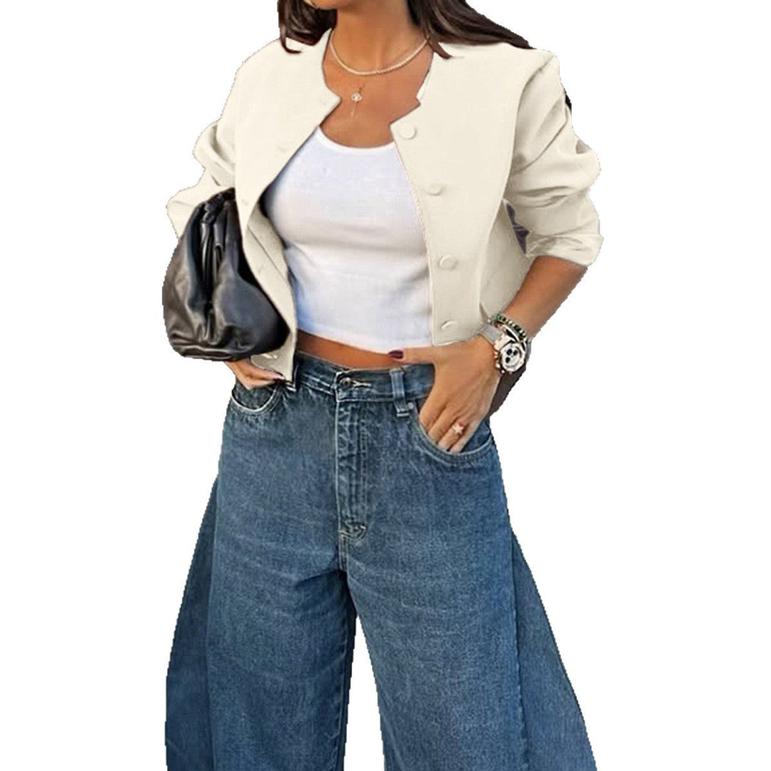 Dam oversized ulljacka med snap knäppning, boxy silhuett, och påsydda fickor