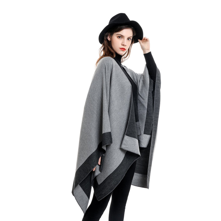 Dam Reversible poncho-Cape tillverkad av Cashmere Blend med oversized skärning