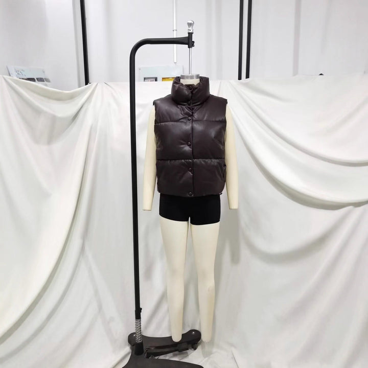 Dam vadderad konstläder väst med high ståkrage, snap knäppning och waist drawstring