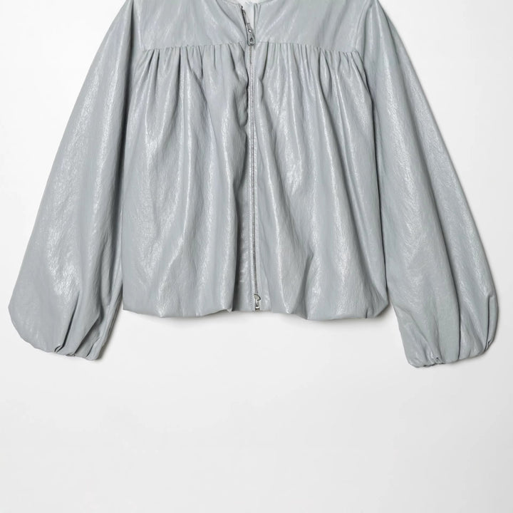 Dam kort glansig oversized bomberjacka med gathered chest yoke och voluminous balloon ärmar