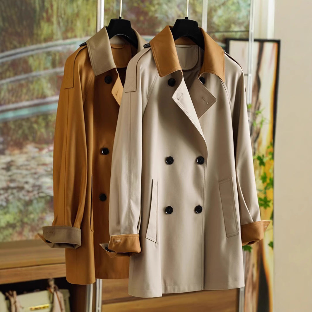 Dam elegantly skräddad trenchcoat med a belted midja