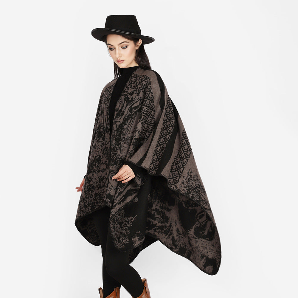 Dam jacquard stickad cape med ståkrage och graphic forest design