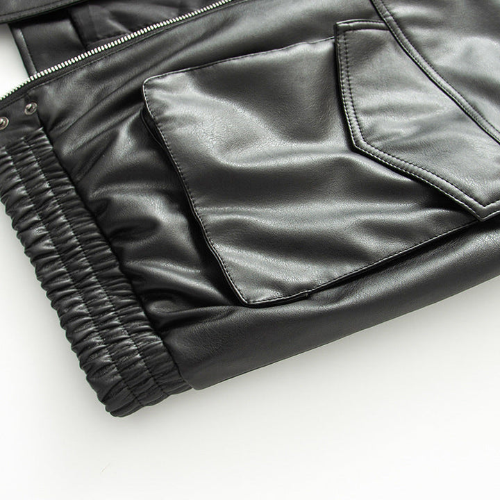 Dam figurnära konstläder blouson med voluminous fuskpälskrage och flap fickor