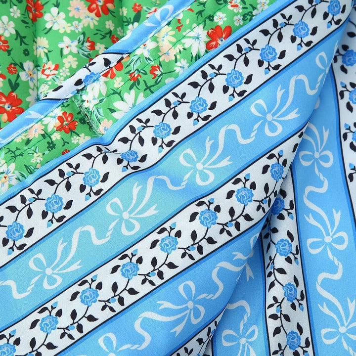 Dam quiltad floral jacka med rund hals, kontrast piping och påsydda fickor